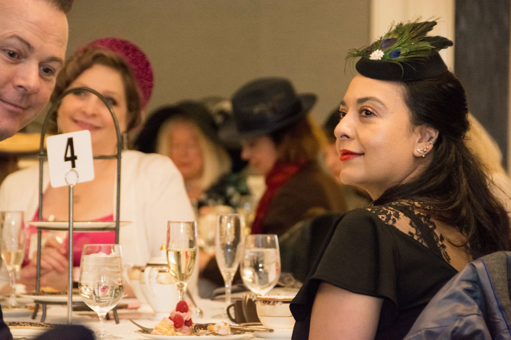 A guest watches the opera performance at Royal Tea with Winter Opera